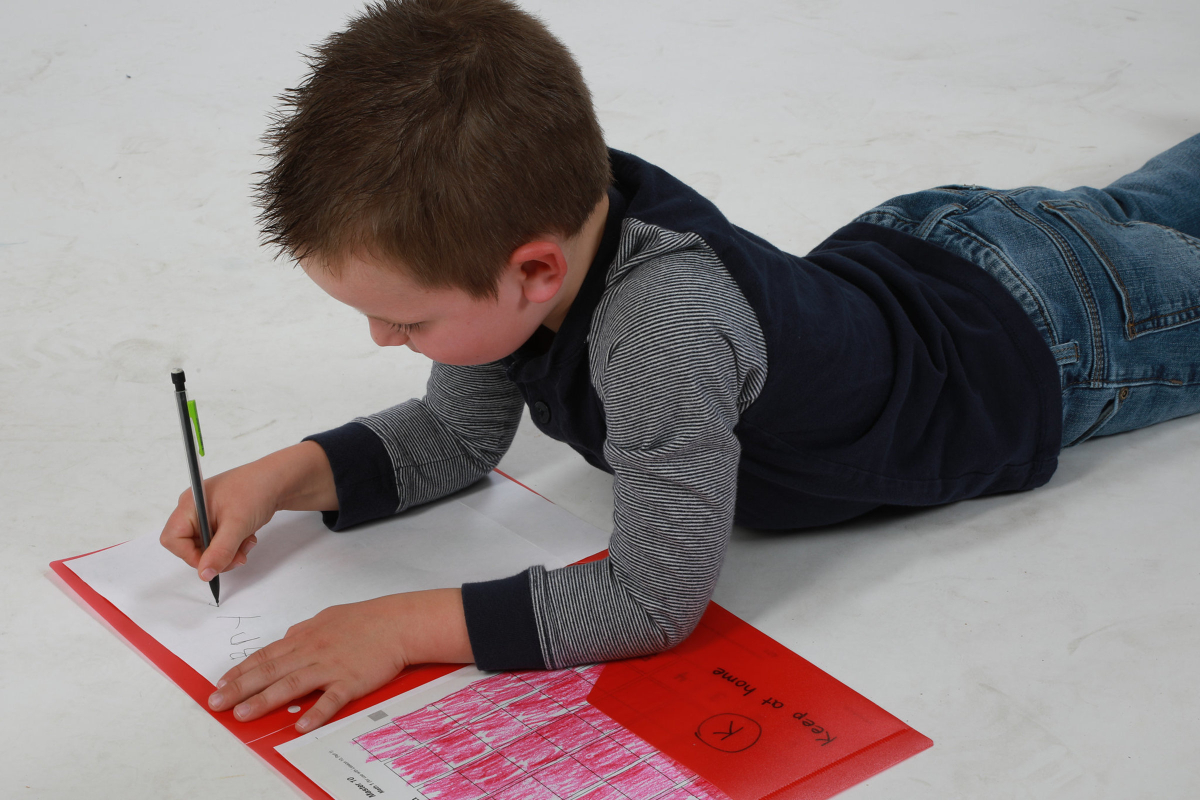 Solace Boy Doing Homework Pediatric Home Healthcare